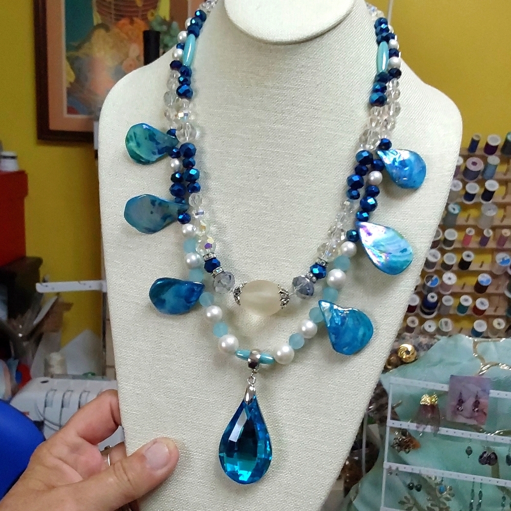 Artisan made blue AB Crystal and shell necklace 22 to 24 in silvertone